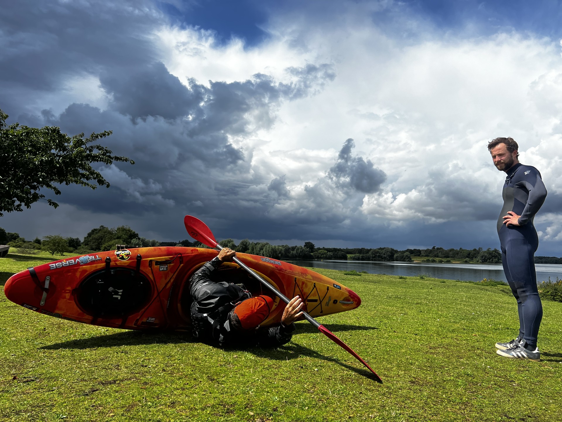 Bank demonstration of an eskimo sweep roll with NOMAD Sea Kayaking.