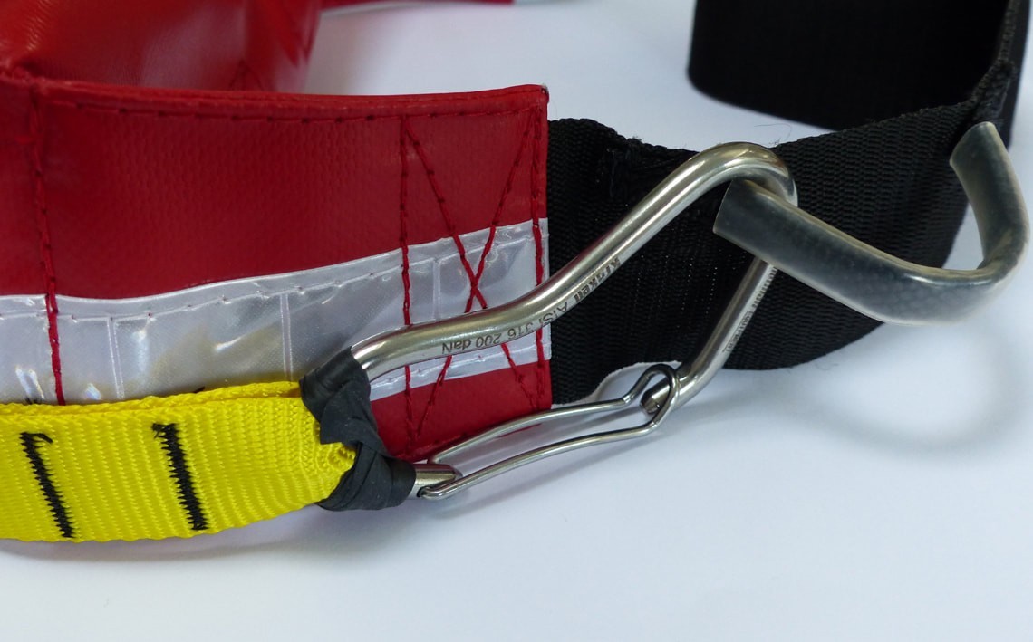 Whetman Kraken tow system with tape and carabiner.