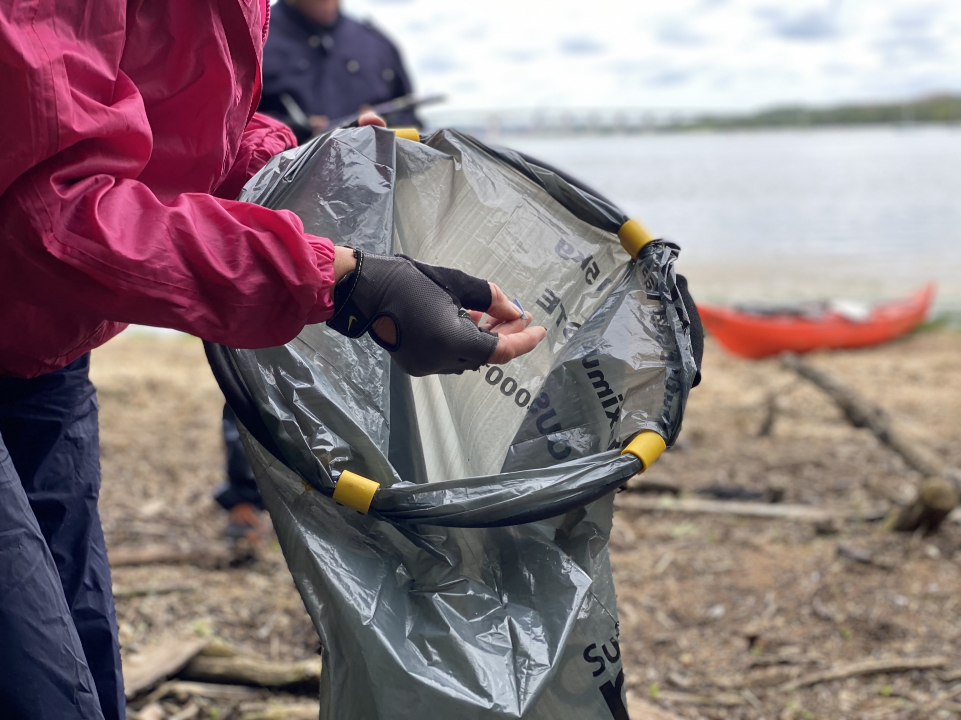 Collecting small plastics on the NOMAD Community Projects beach clean in Suffolk.