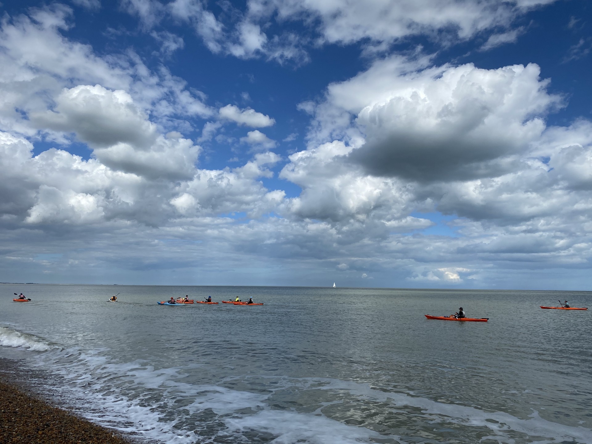 Sea kayaking under summer skies with www.nomadseakayaking.co.uk