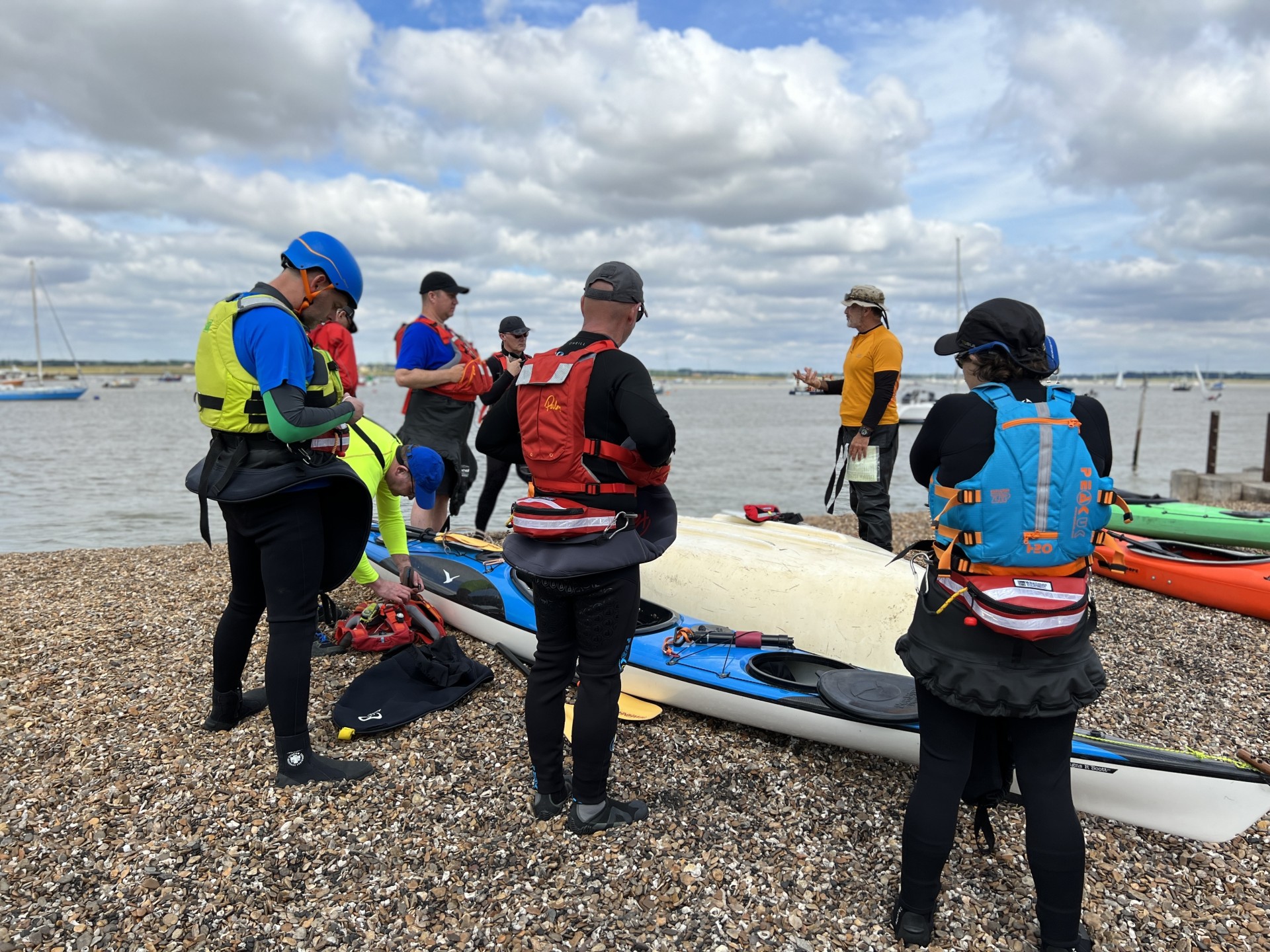 Safety briefing before launching with NOMAD Sea Kayaking.