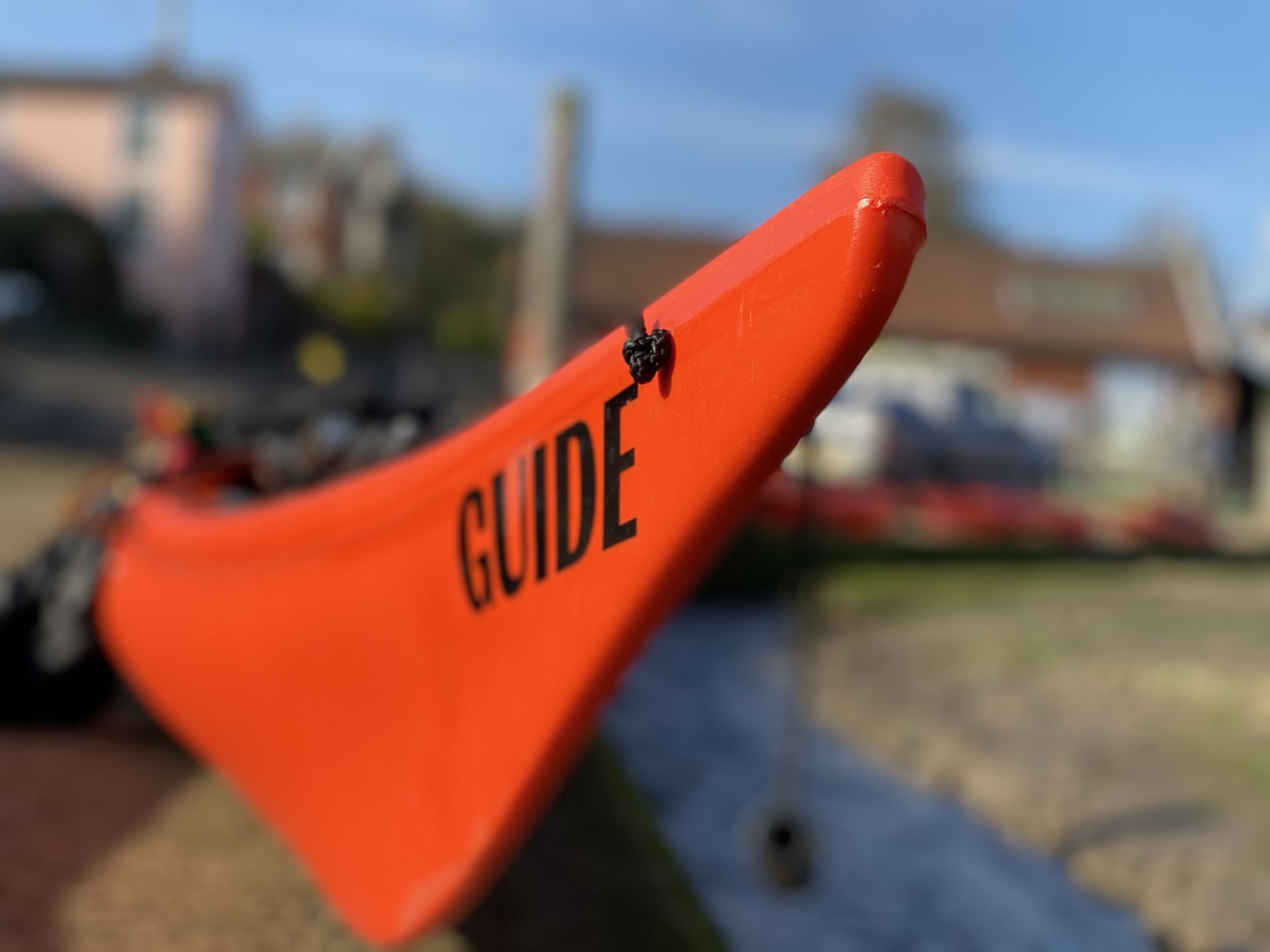 Orange Guide kayak.