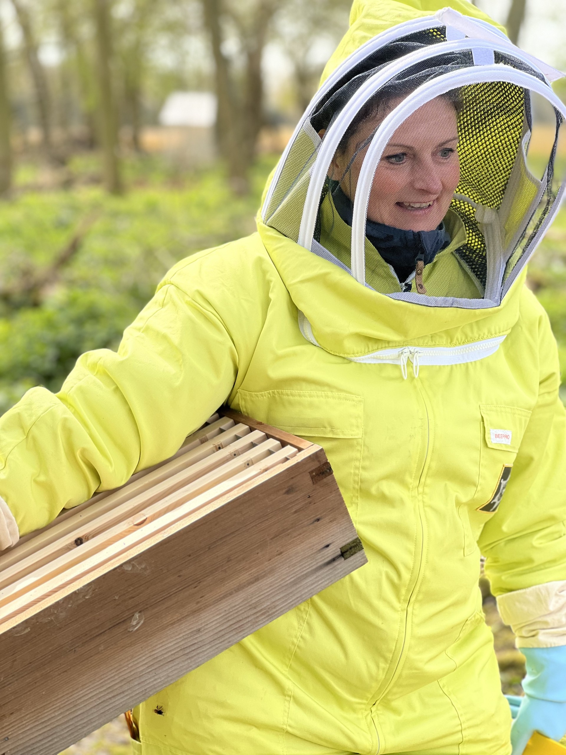 Our NOMAD Community Projects bee keeper in her bee suit.