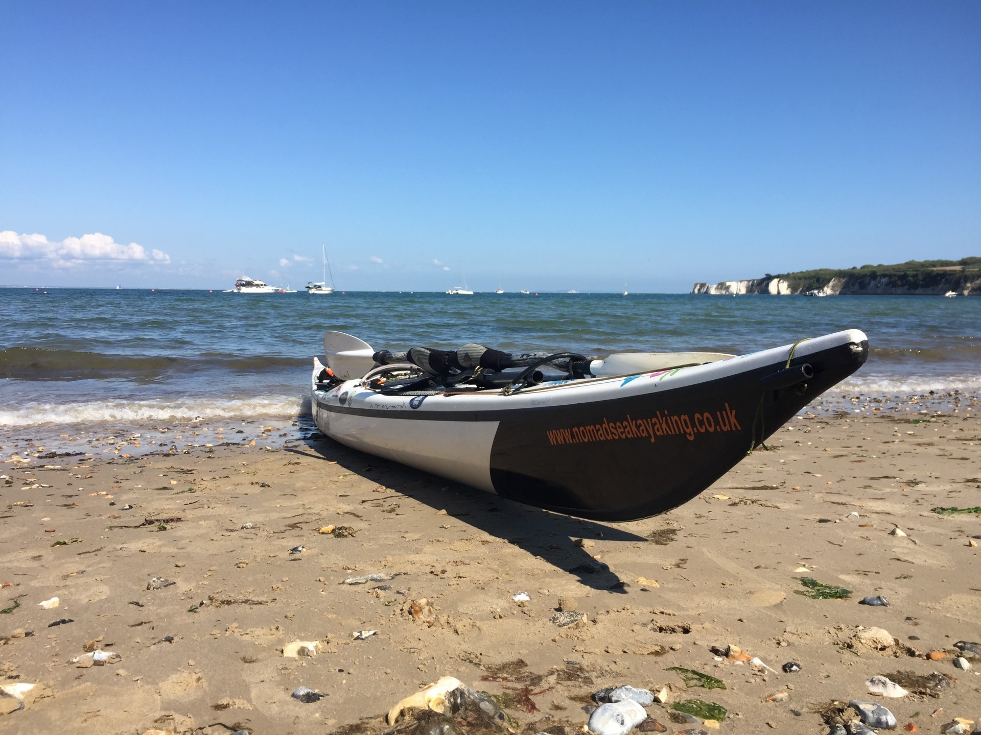 Nigel Dennis design NDK Explorer HV composite sea kayak on a beach