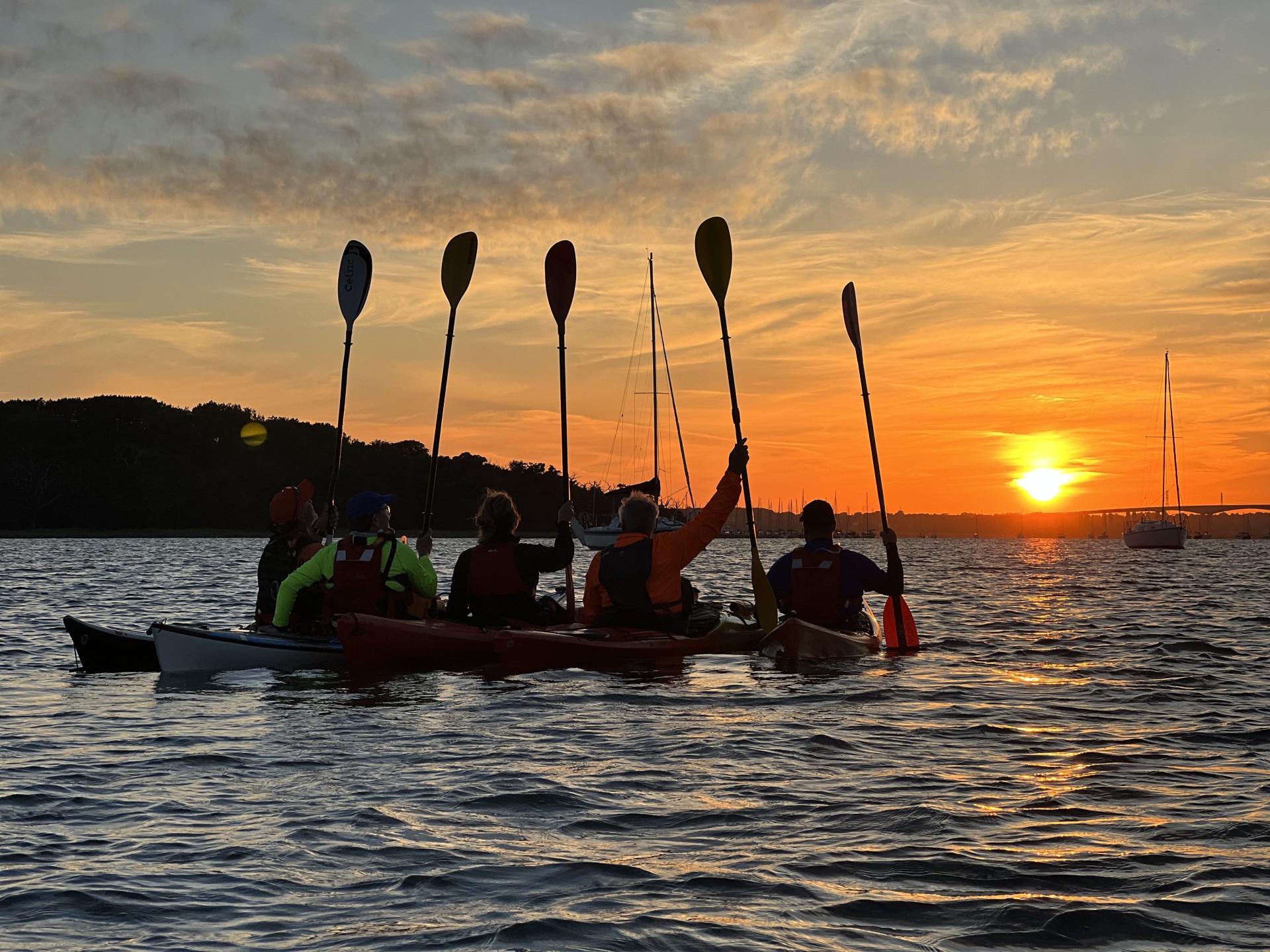 Counting off sea kayakers on the night trip with NOMAD Sea Kayaking.