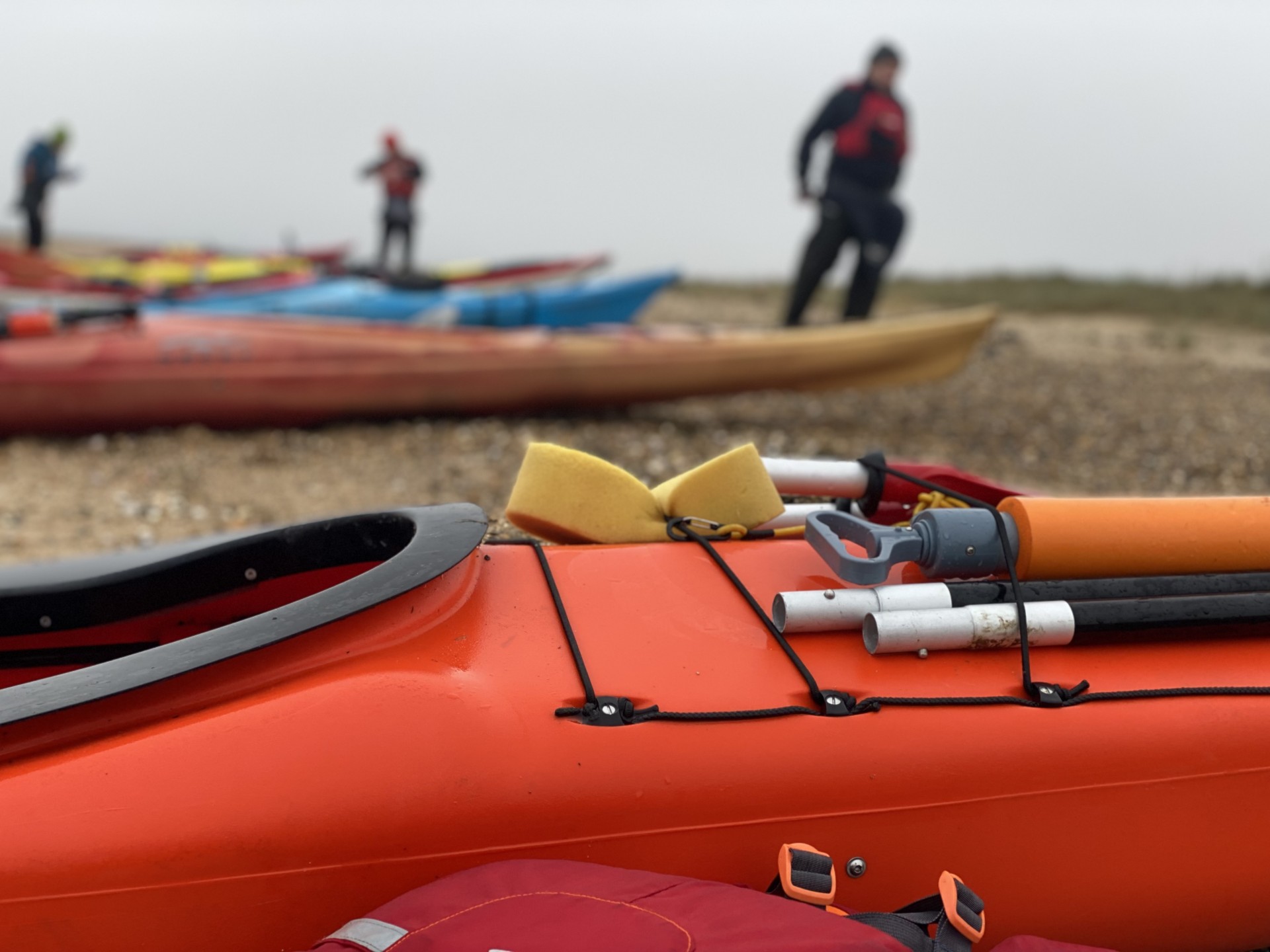 Orange with black accents NDK RM Sport Sea Kayaks used for sale.