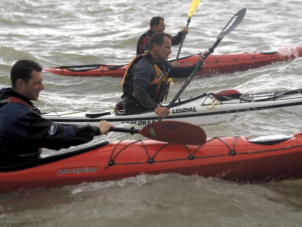Sea kayakers in bumpy waters in Essex.