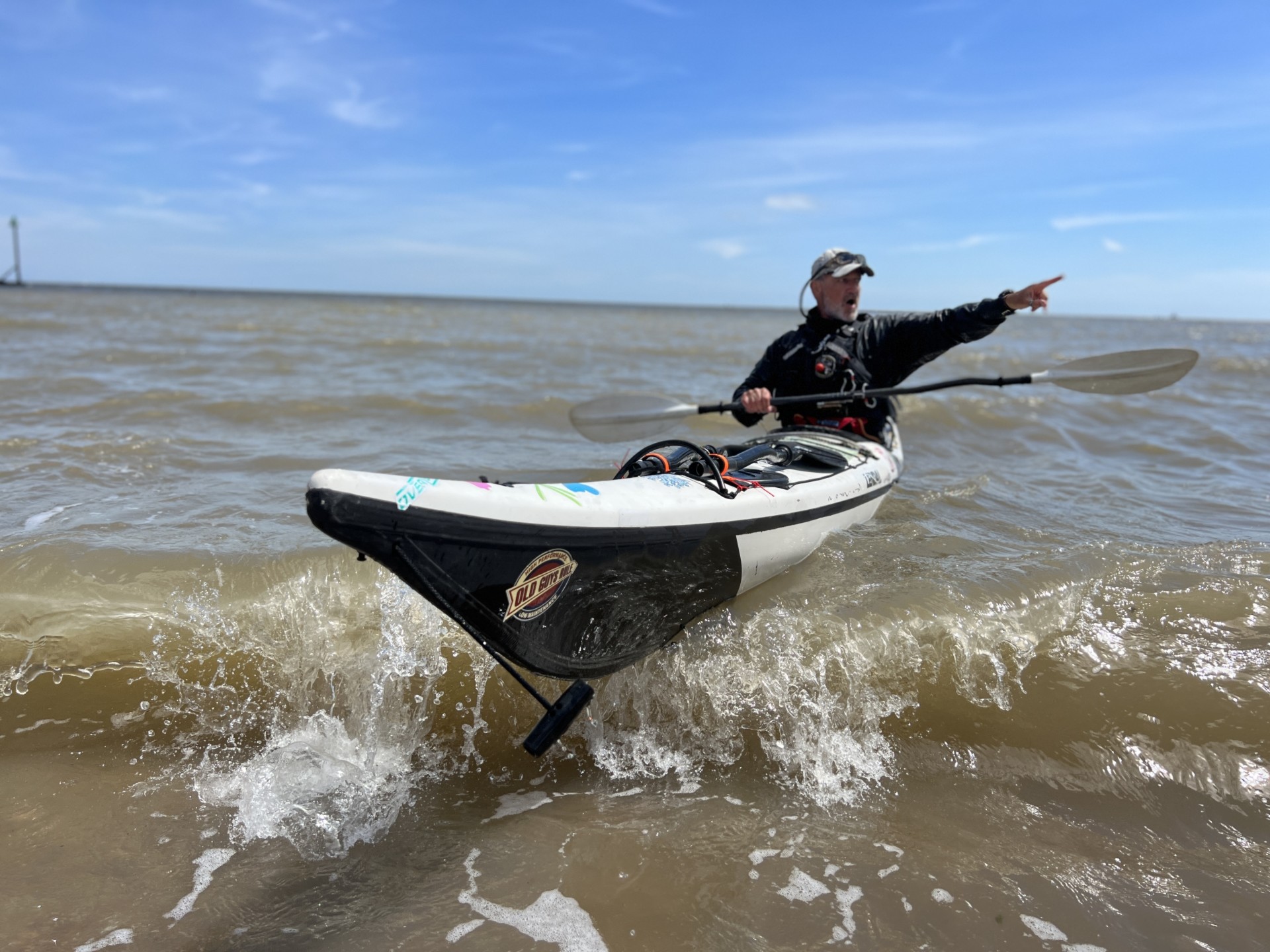 Coaching from a sea kayak on a training course.