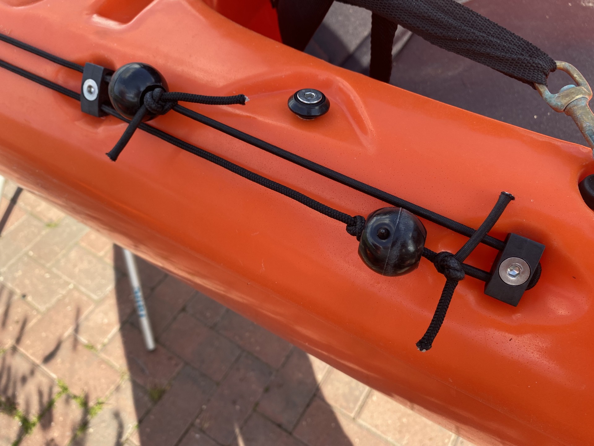 Sit-on-top kayak rudder engagement slider