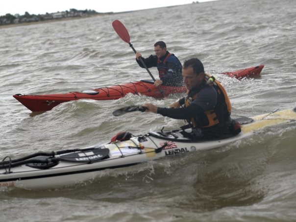 Sea kayakers paddling off Brightlingsea in Essex.