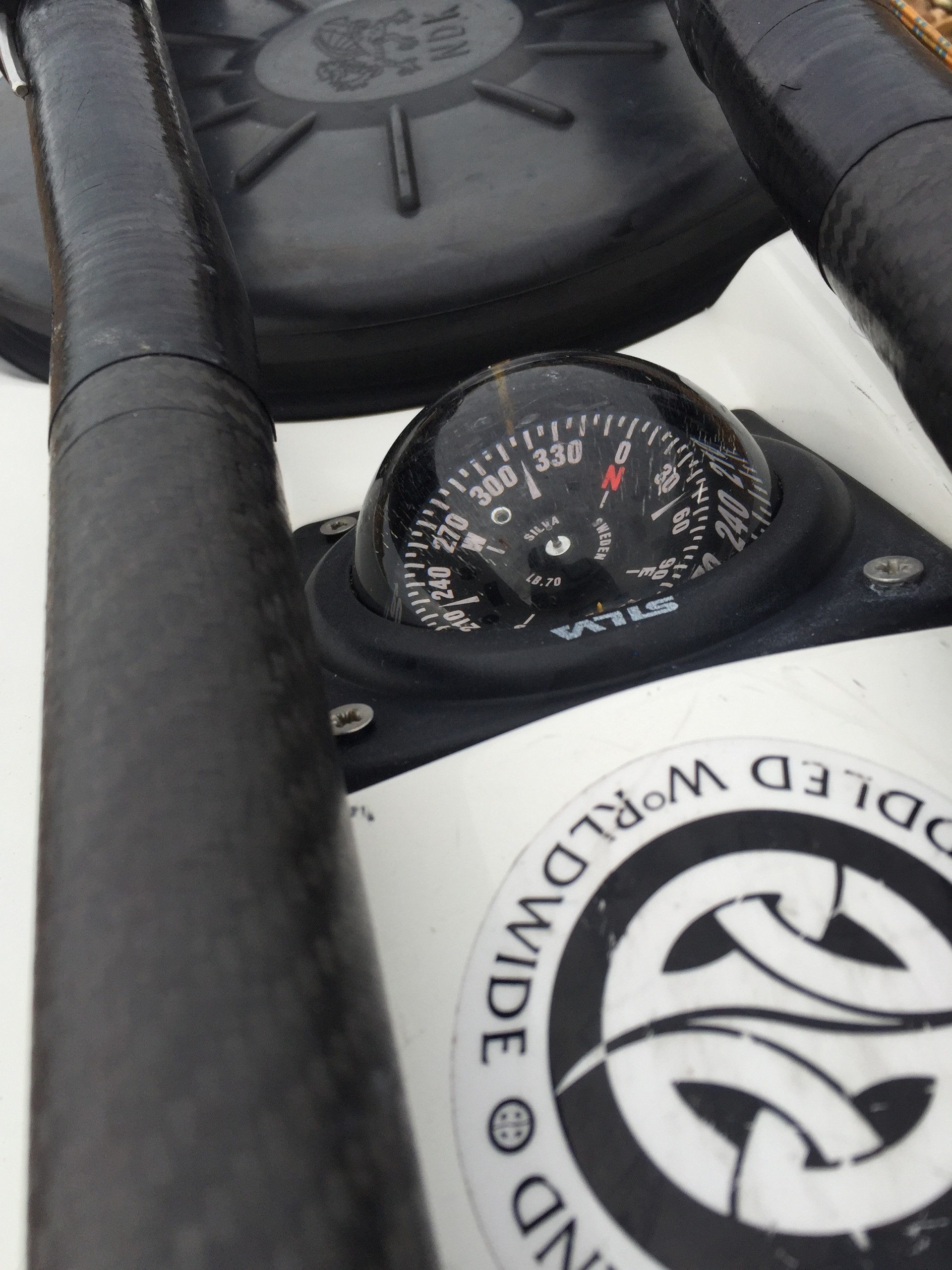 A deck compass on an expedition sea kayak.