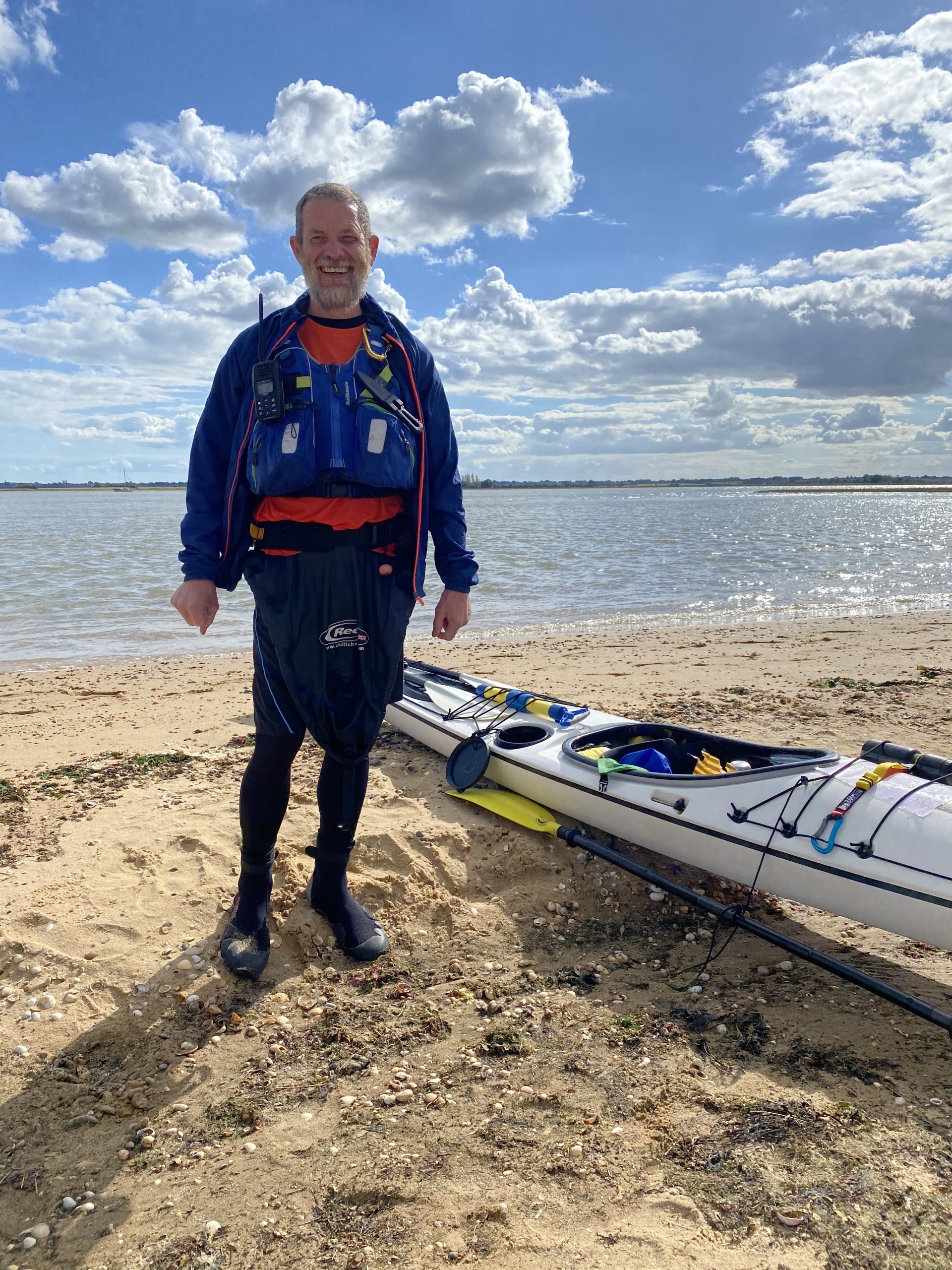 A sea kayak guide on the beach.
