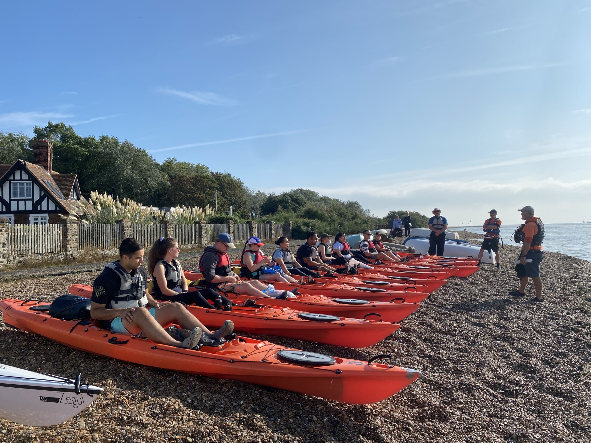 Guests being safety briefed for their weekend of kayaking & wild camping.