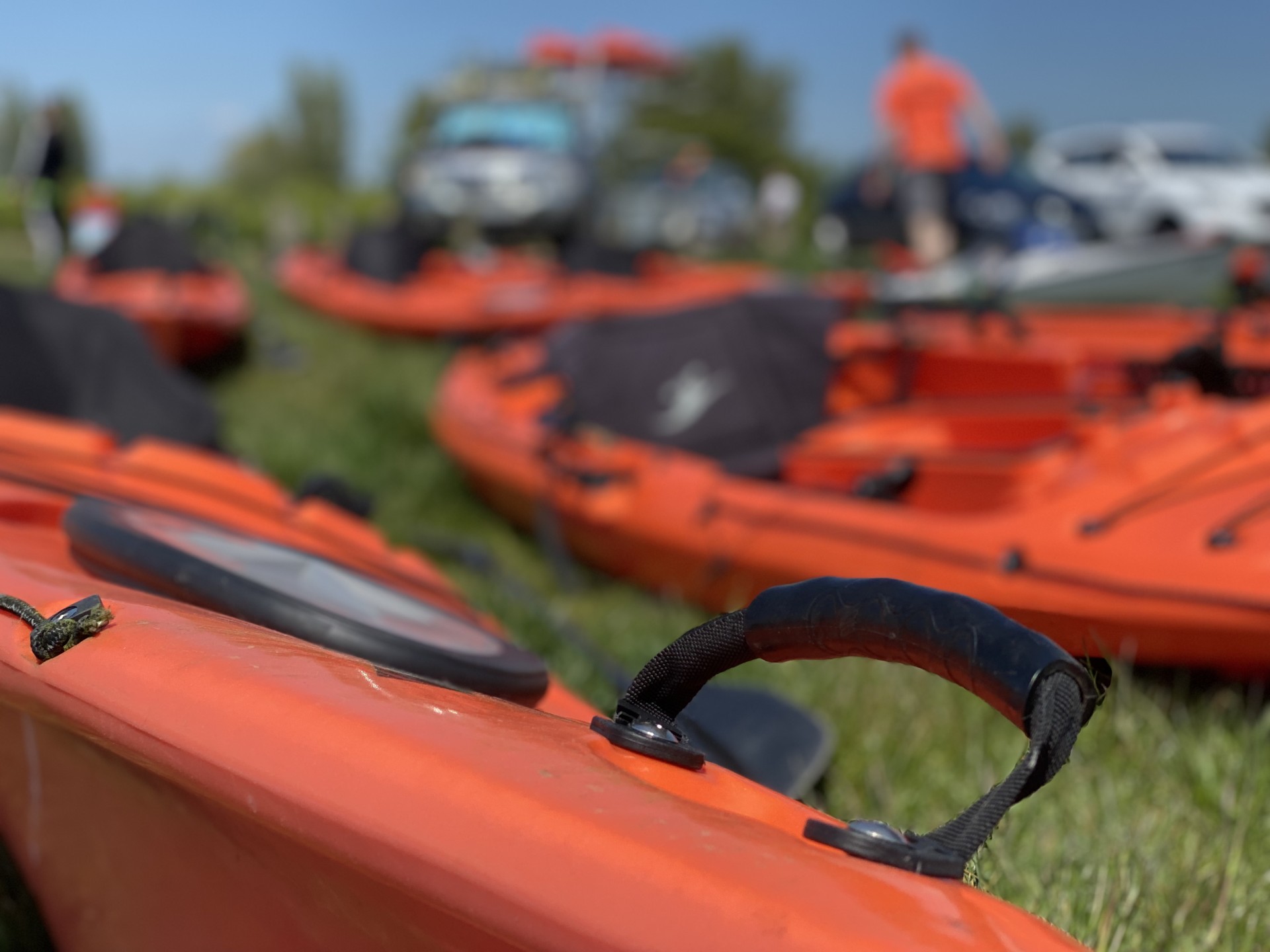 Rear hatch of an orange sea kayak.