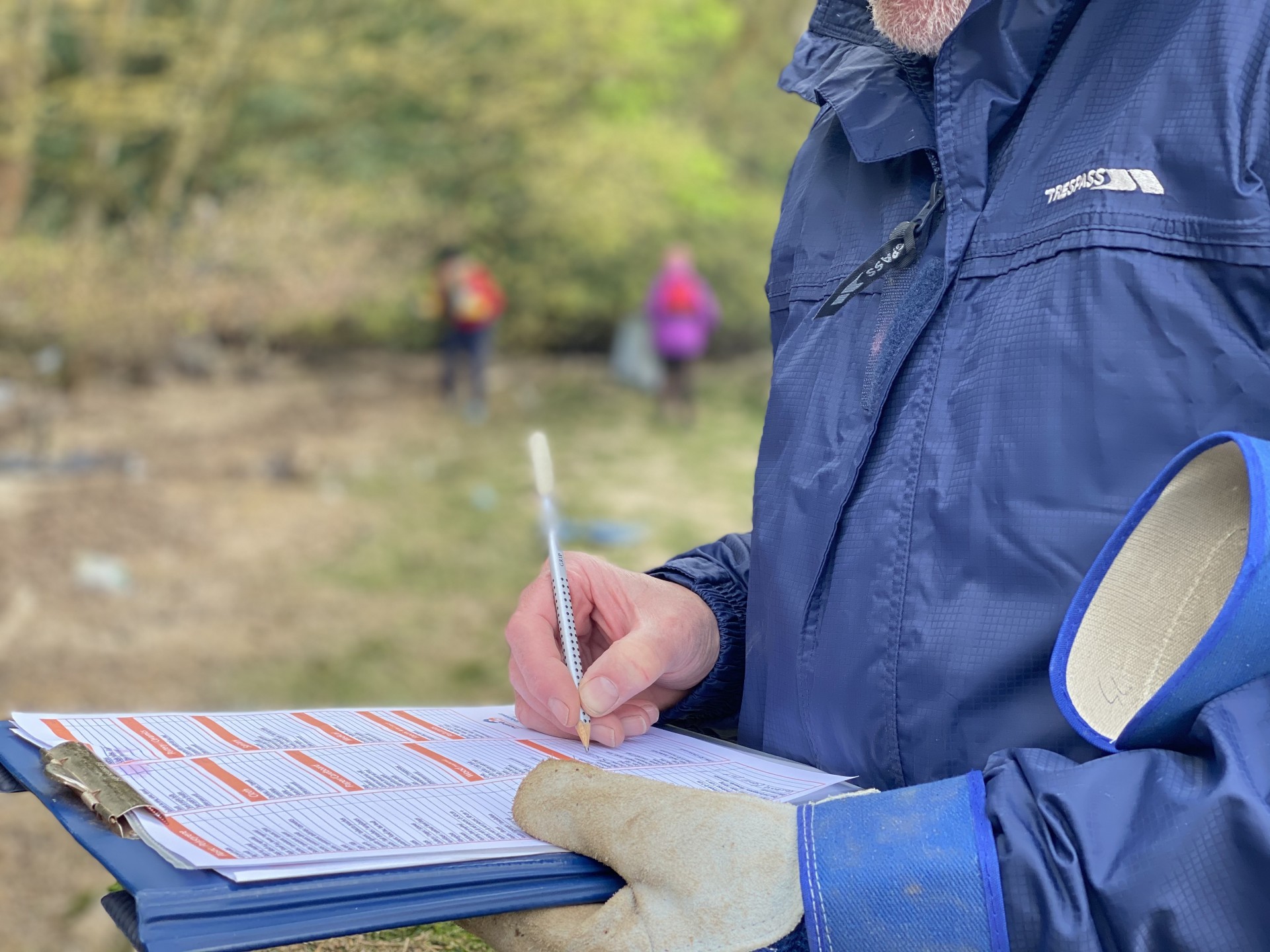 A volunteer recording data for the Marine Conservation Society.