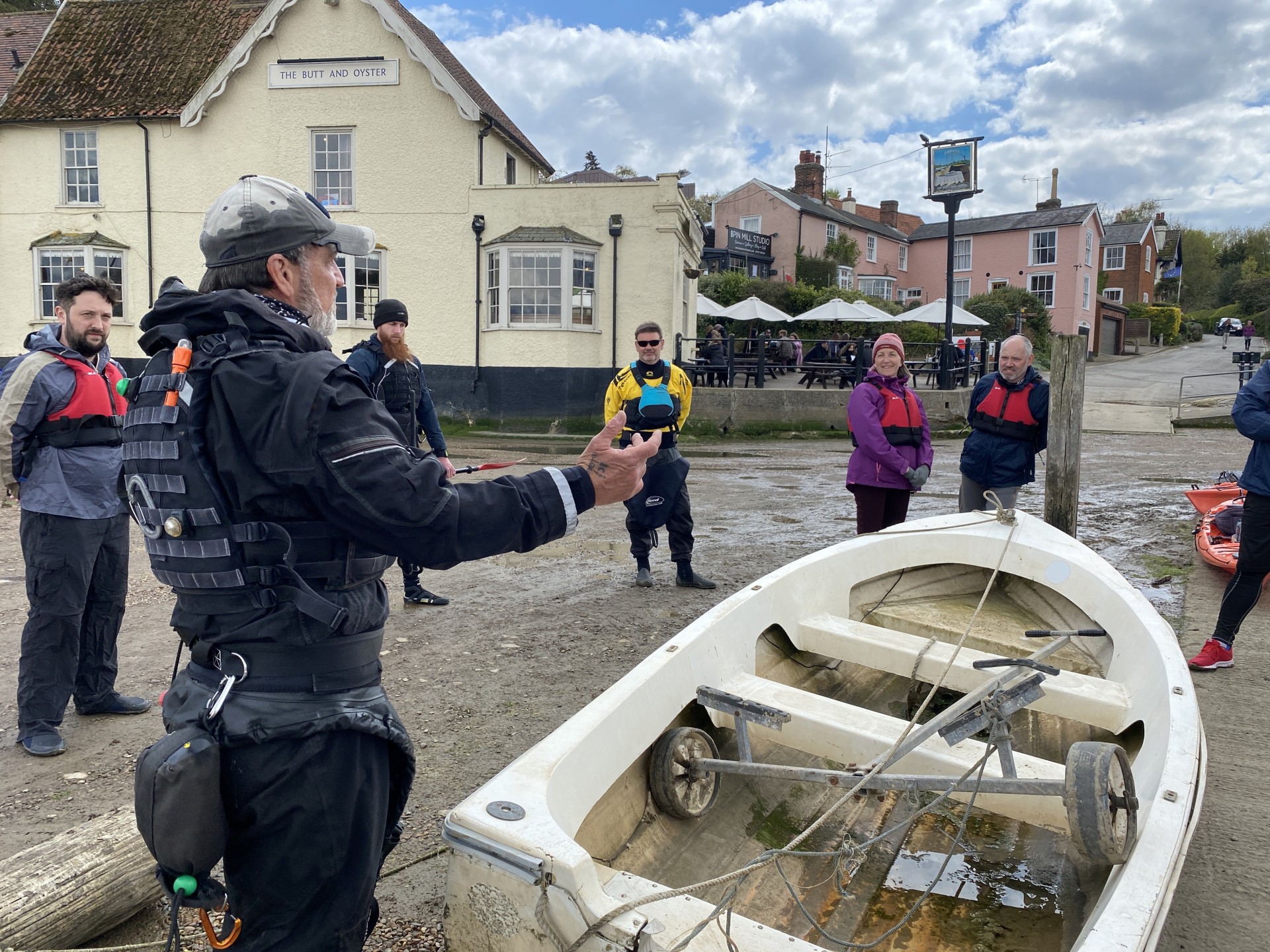 Guide briefing volunteers prior to launch for the event beach clean by kayak in Suffolk.