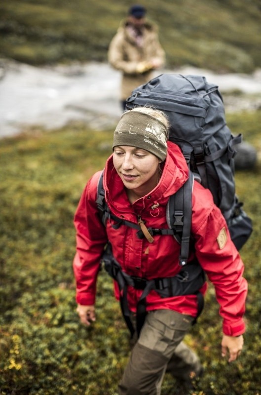 Hiker in the mountains with a large rucksack