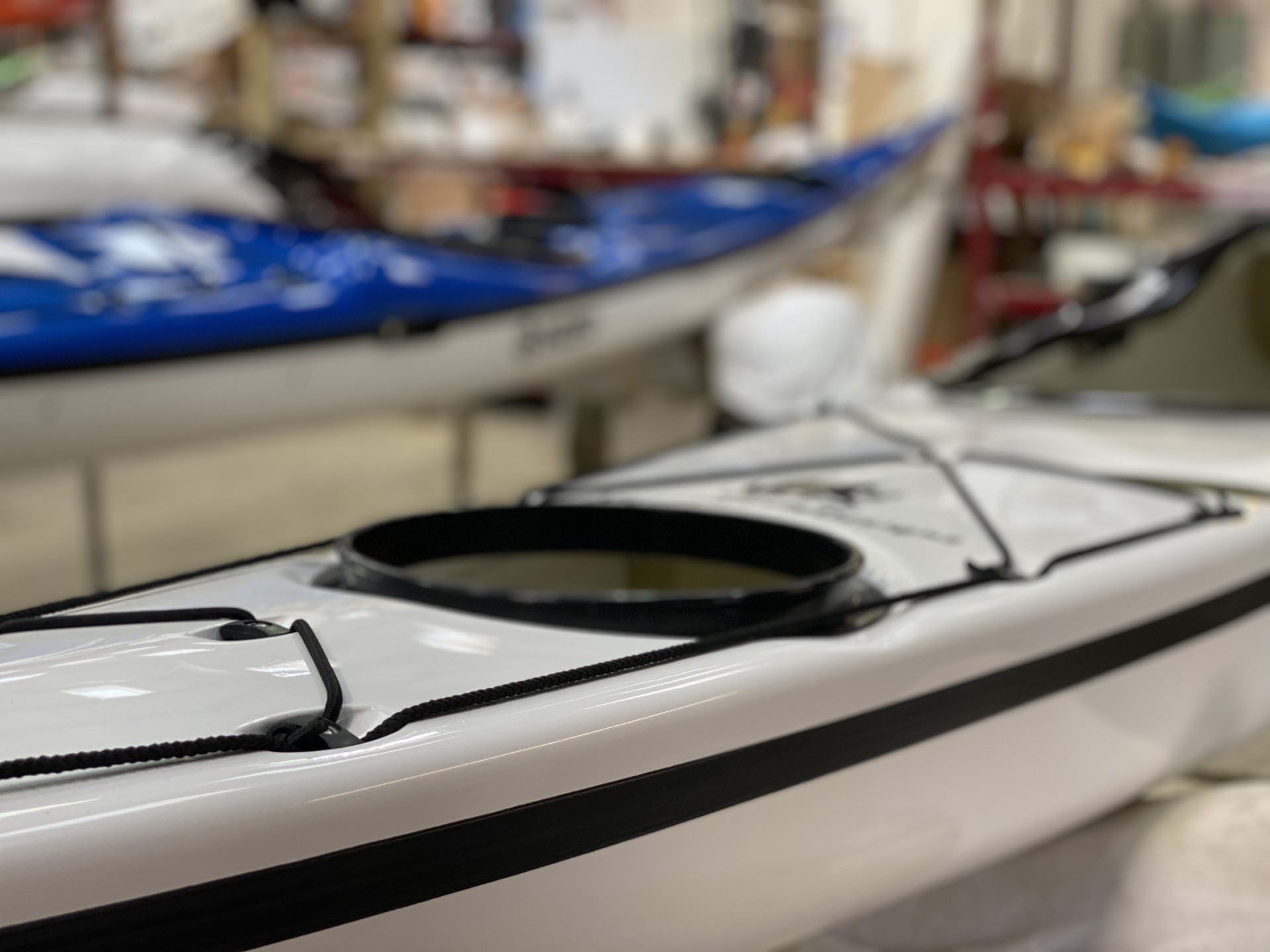 Romany Surf composite sea kayak showing the open rear hatch
