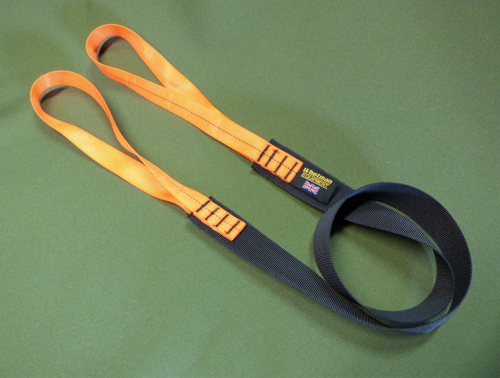 Black & Orange webbing straps for carrying kayaks with NOMAD Sea Kayaking.