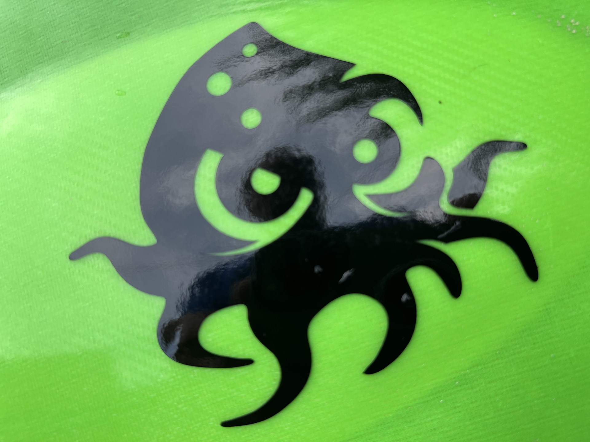 Kraken motif of NOMAD Sea Kayaking.