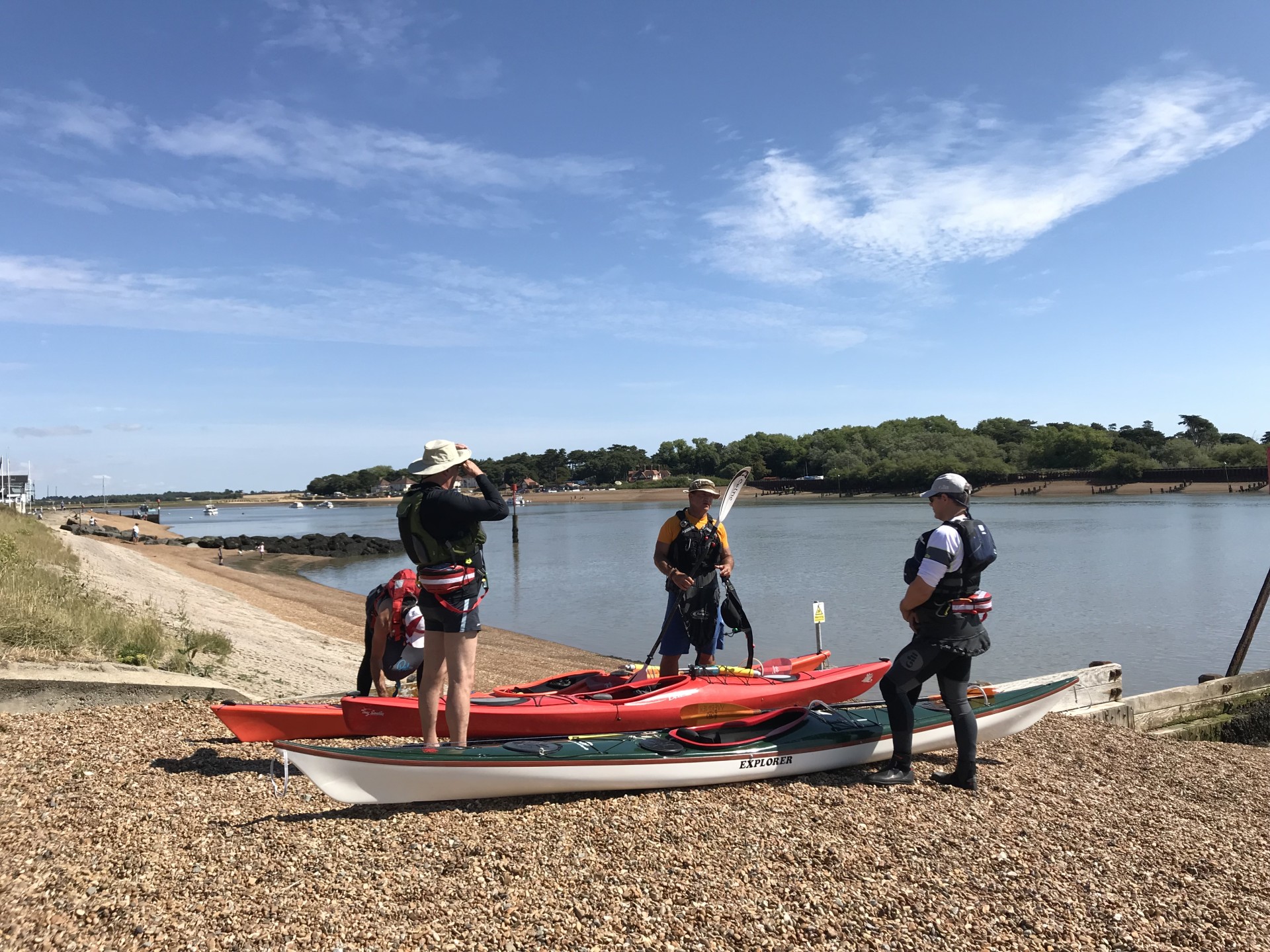 Sea kayakers preparing to launch in to the Deben estuary with NOMAD Sea Kayaking.