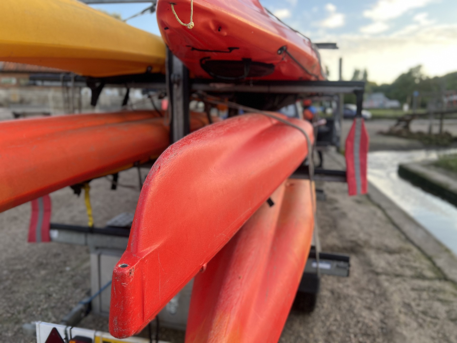 Kayaks loaded on a trailer at Pin Mill with NOMAD Sea Kayaking.