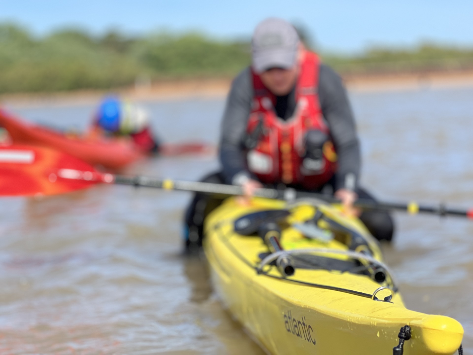 Balancing exercises on sea kayaks.