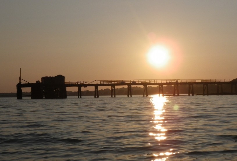 The old pier on the Stour estuary at sunset.