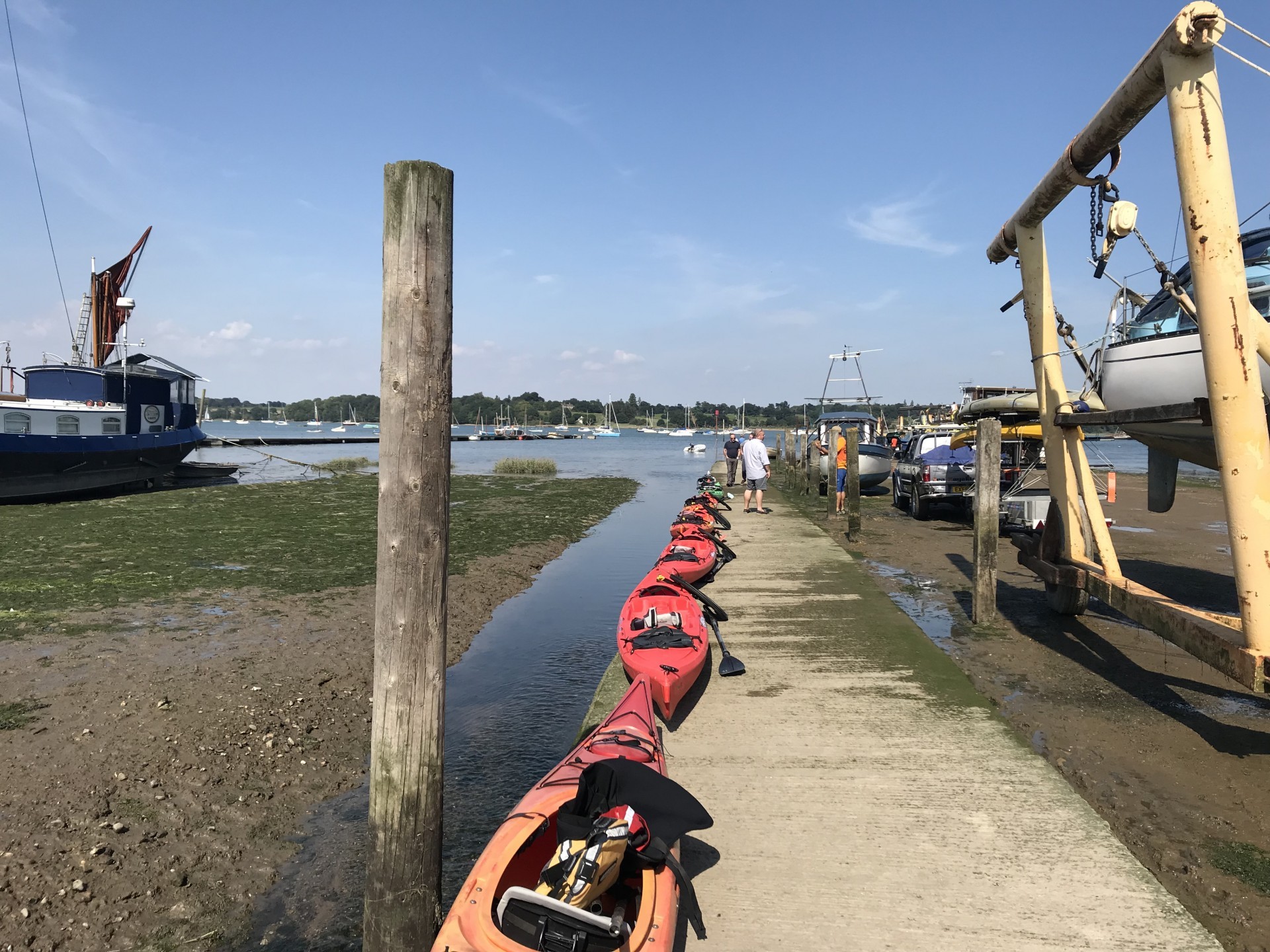 Kayaks on the slip awaiting launch on the Orwell estuary during the Discover Kayaking day trip.