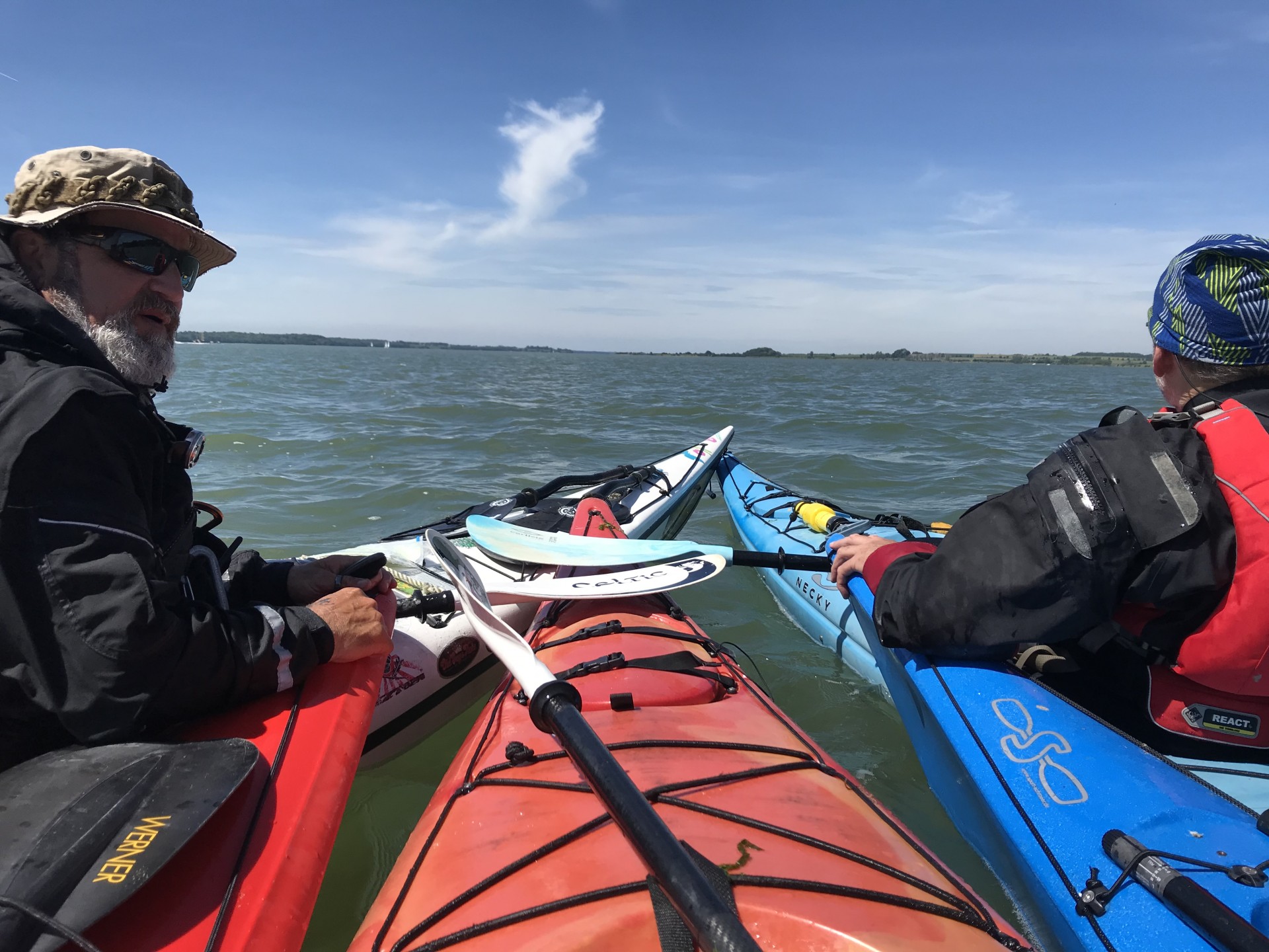 Sea kayakers at sea training skills with NOMAD Sea Kayaking