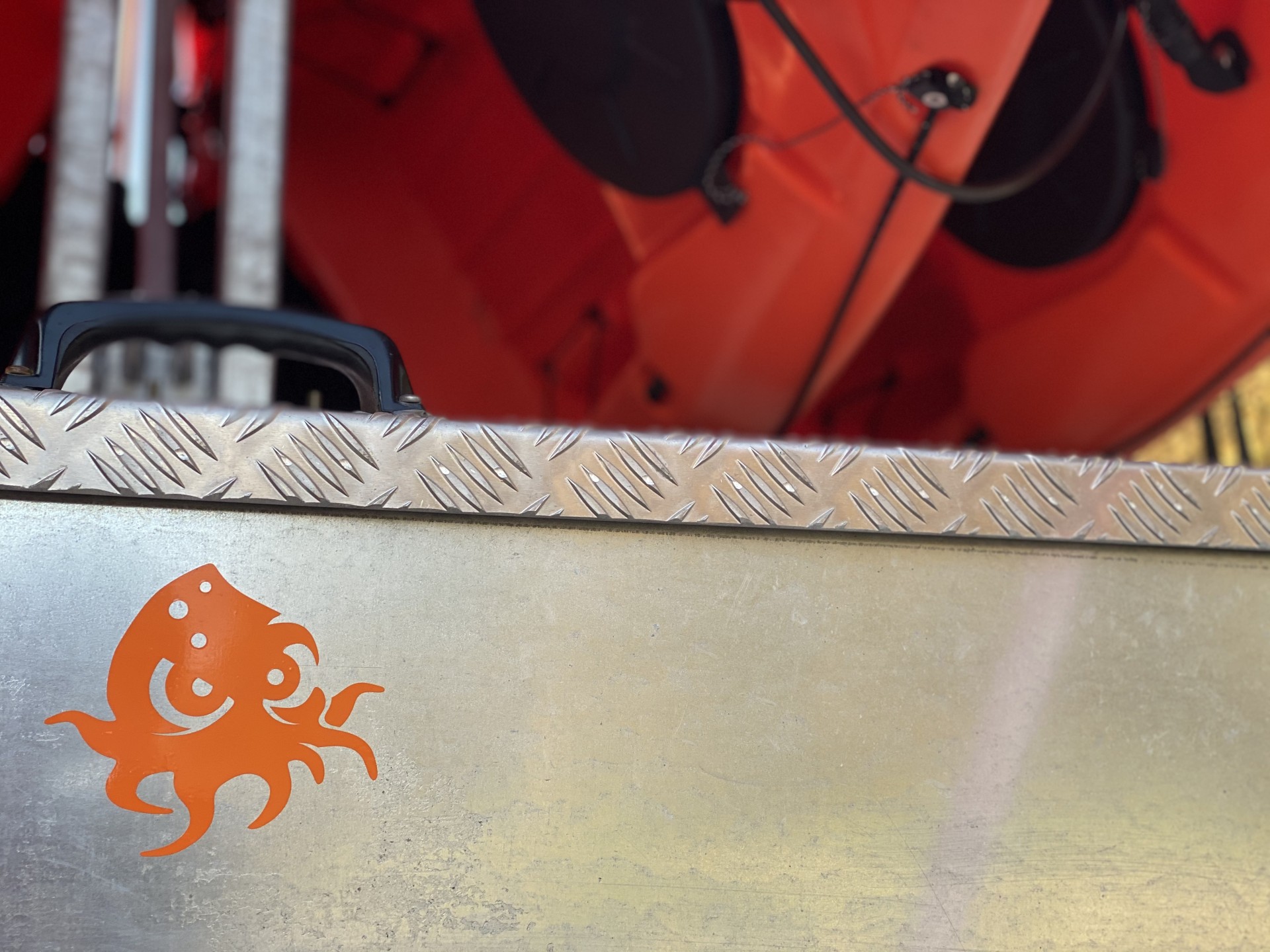 Bab Kraken sticker on a NOMAD Sea Kayaking's Trailer.