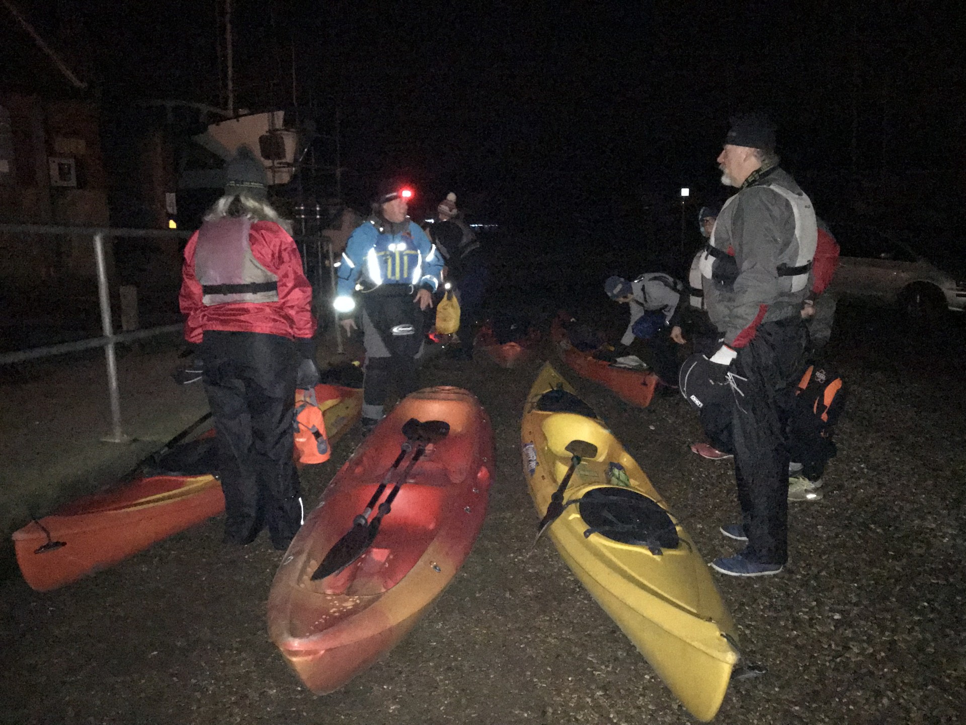 Guests & guide preparing to launch kayaks for the New Years eve fireworks kayak trip