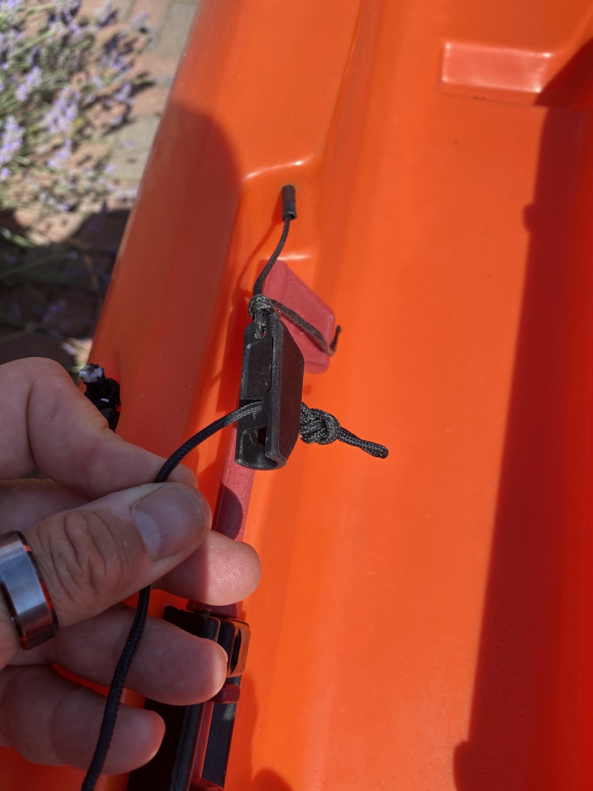 Sit-on-top kayak rudder foot adjustment