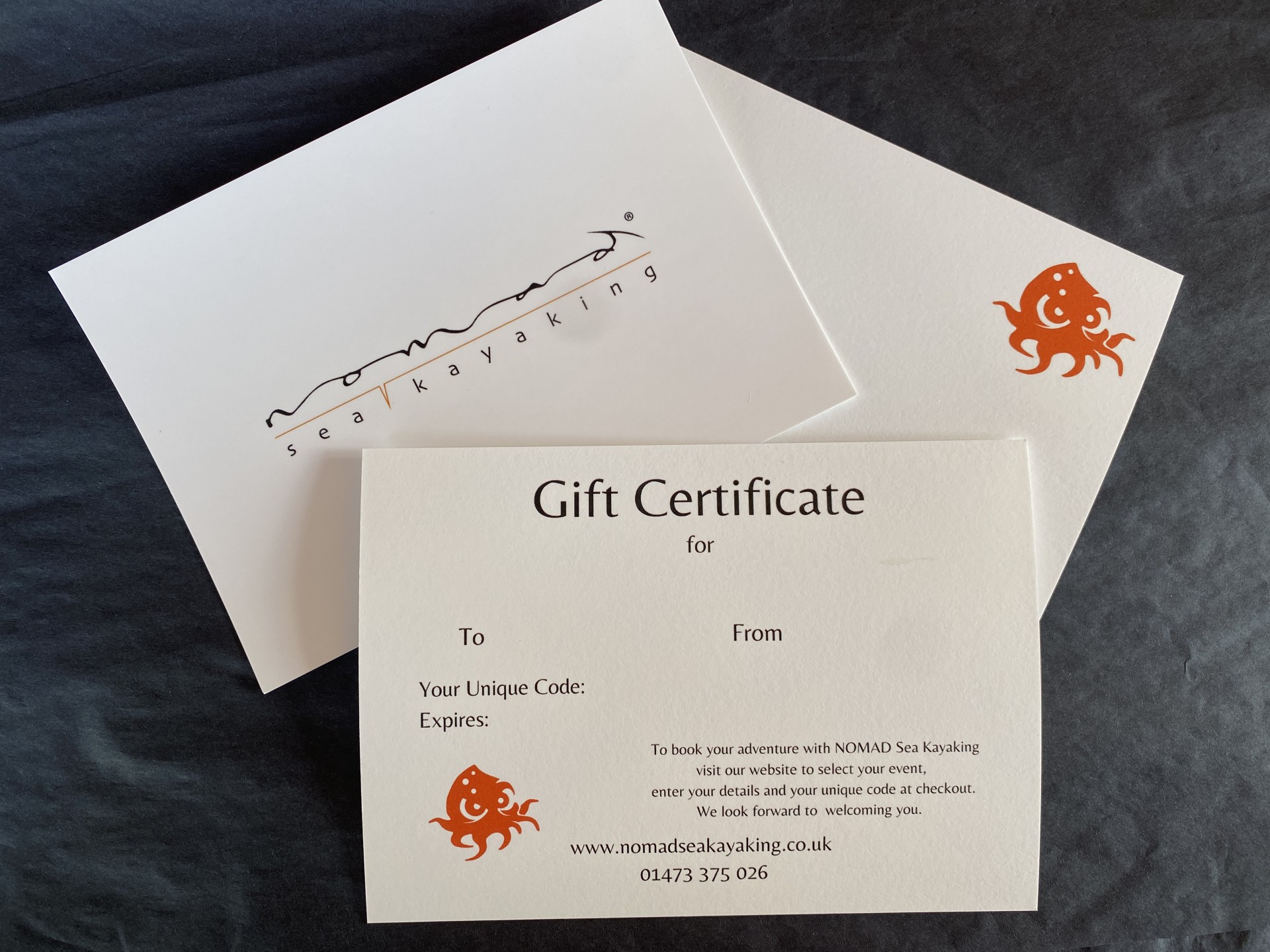 Gift wrapped gift certificate for kayaking courses and trips in Suffolk.