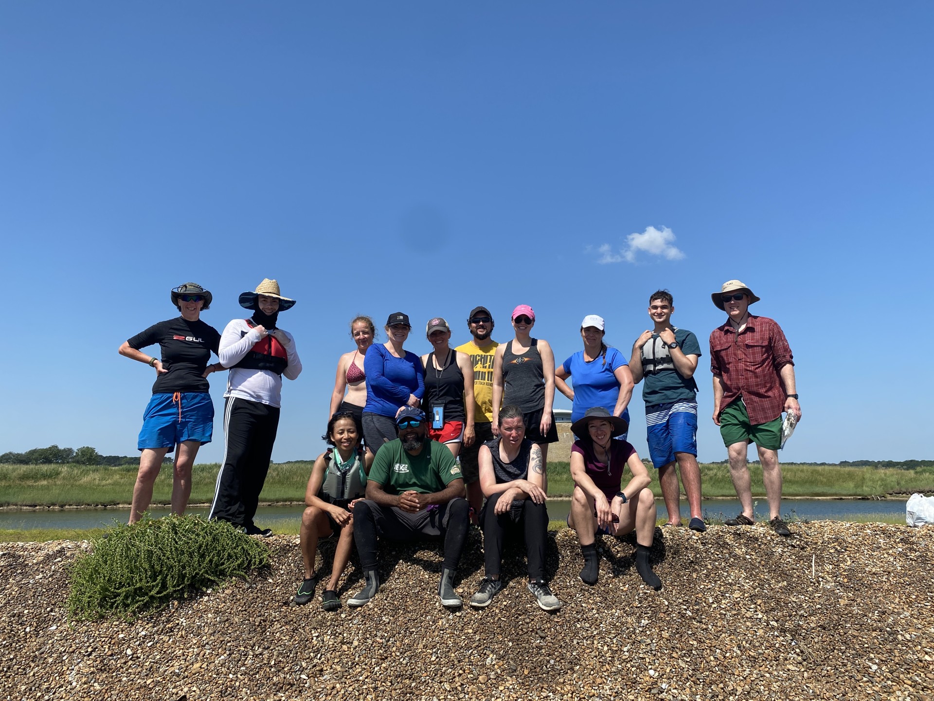A group photo of guests on the Seal Colony Eco Kayak Tour with NOMAD Sea Kayaking.