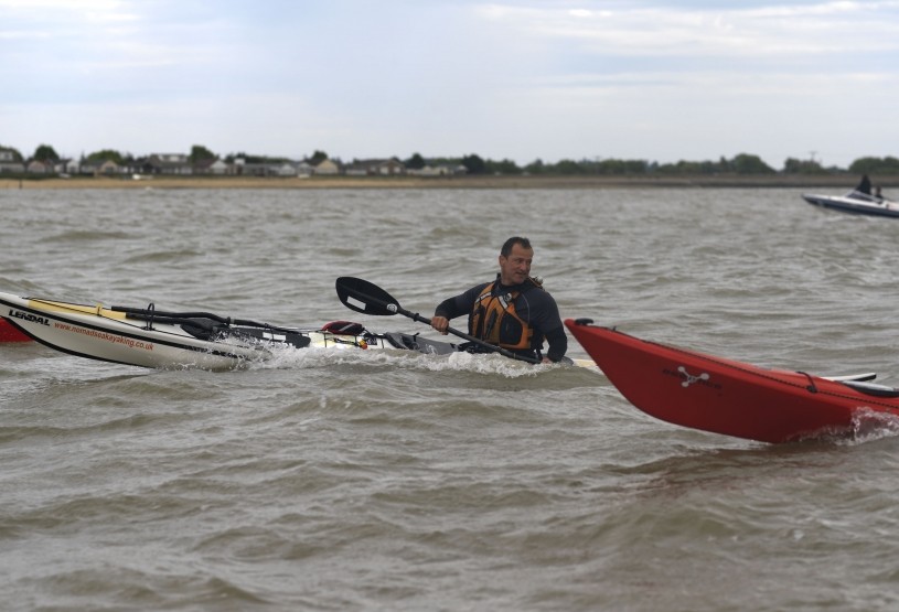 Intermediate Sea Kayaking training course with sea kayakers in good sea conditions.