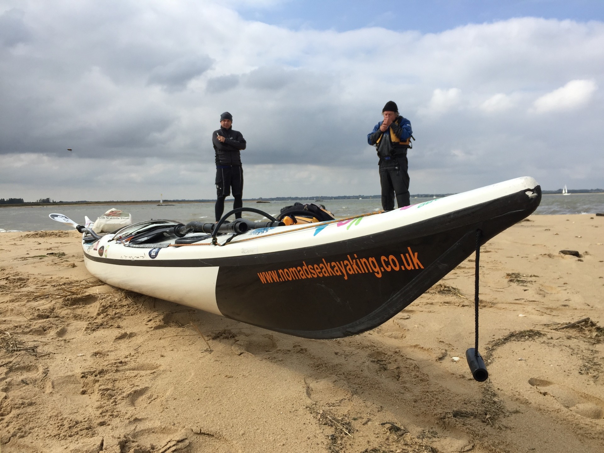 Sea kayak on Stone Point beach in Essex with NOMAD Sea Kayaking.