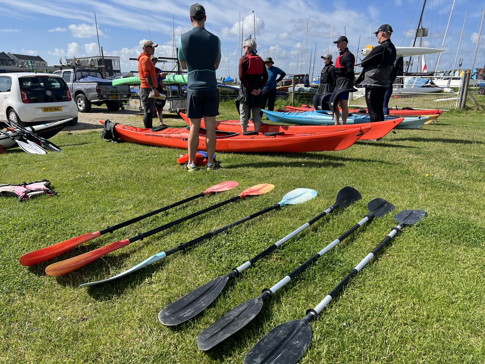 A selection of paddles ready for use with NOMAD Sea Kayaking.