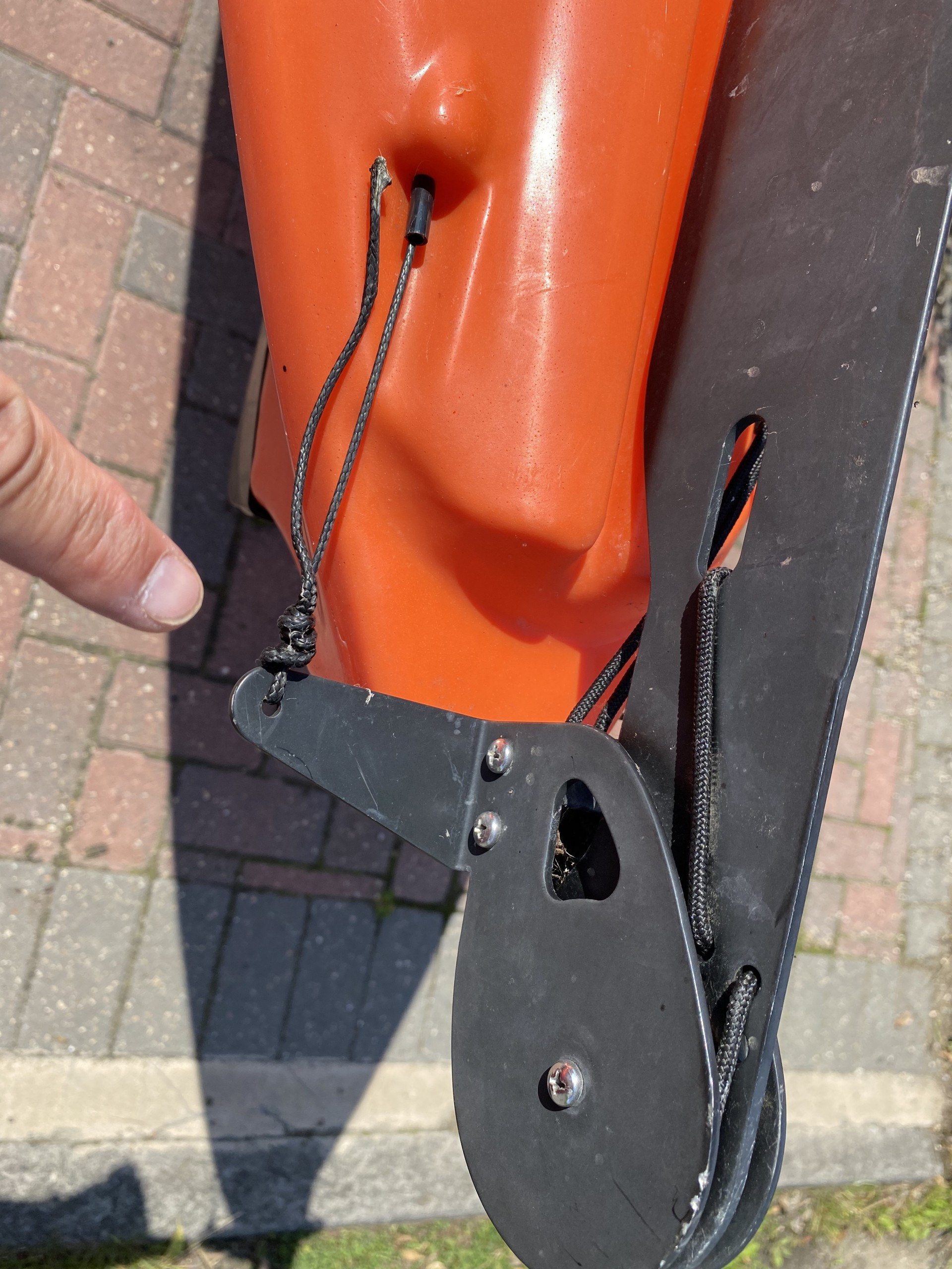 Sit-on-top kayak rudder with steering cable connected.